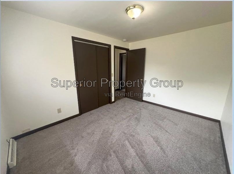 3B/1.5B unit in a 2-story apartment with a private basement and private rear patio. property image